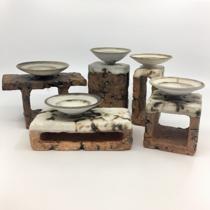Ron Tribe potter candle stands